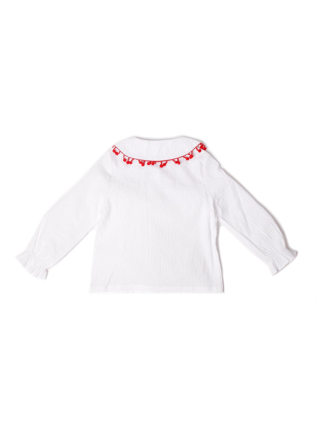 white long sleeve top with mini red heart pompoms