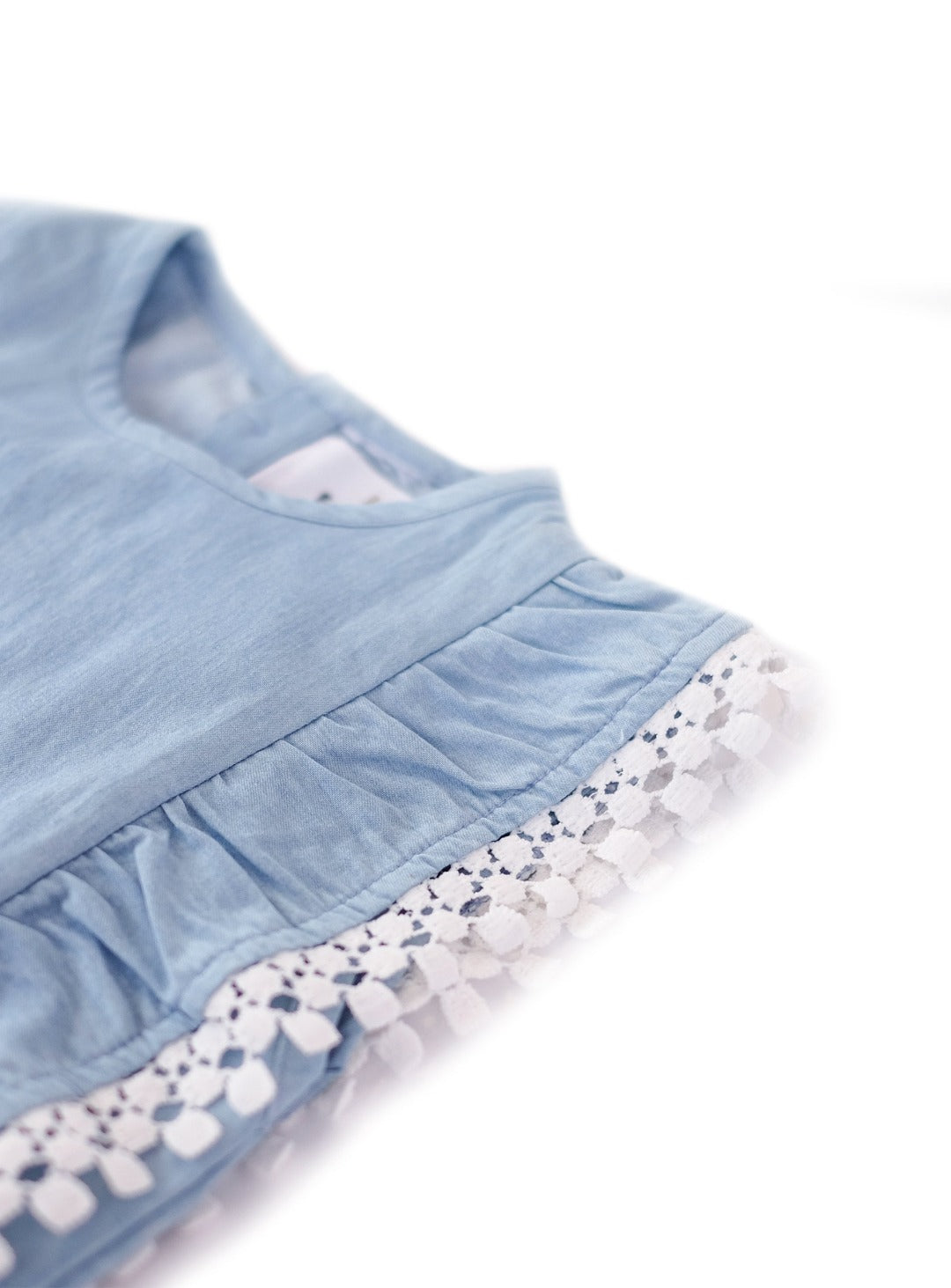 washed blue denim sleeveless top with lace fringe