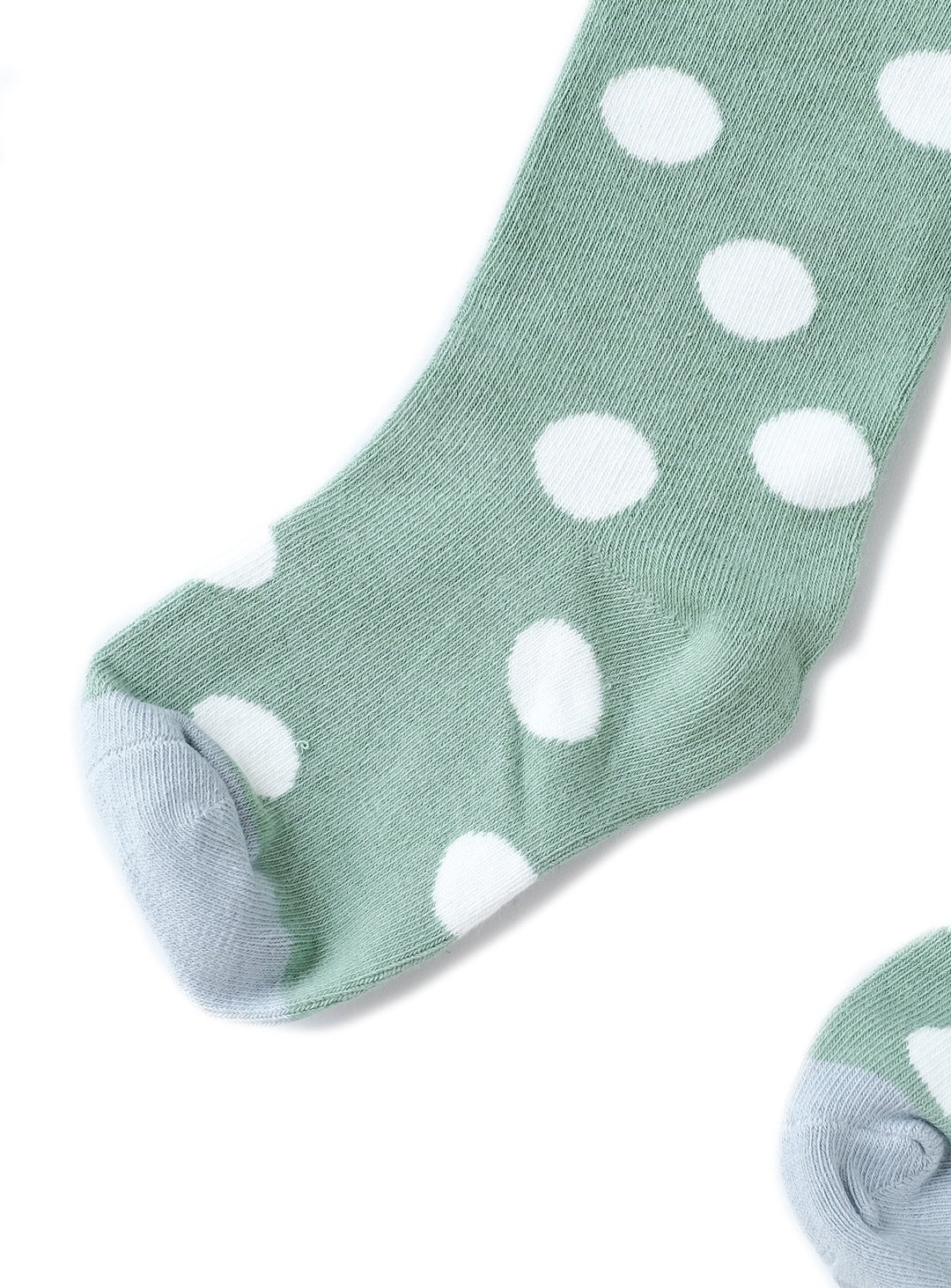 tea green socks with white dots