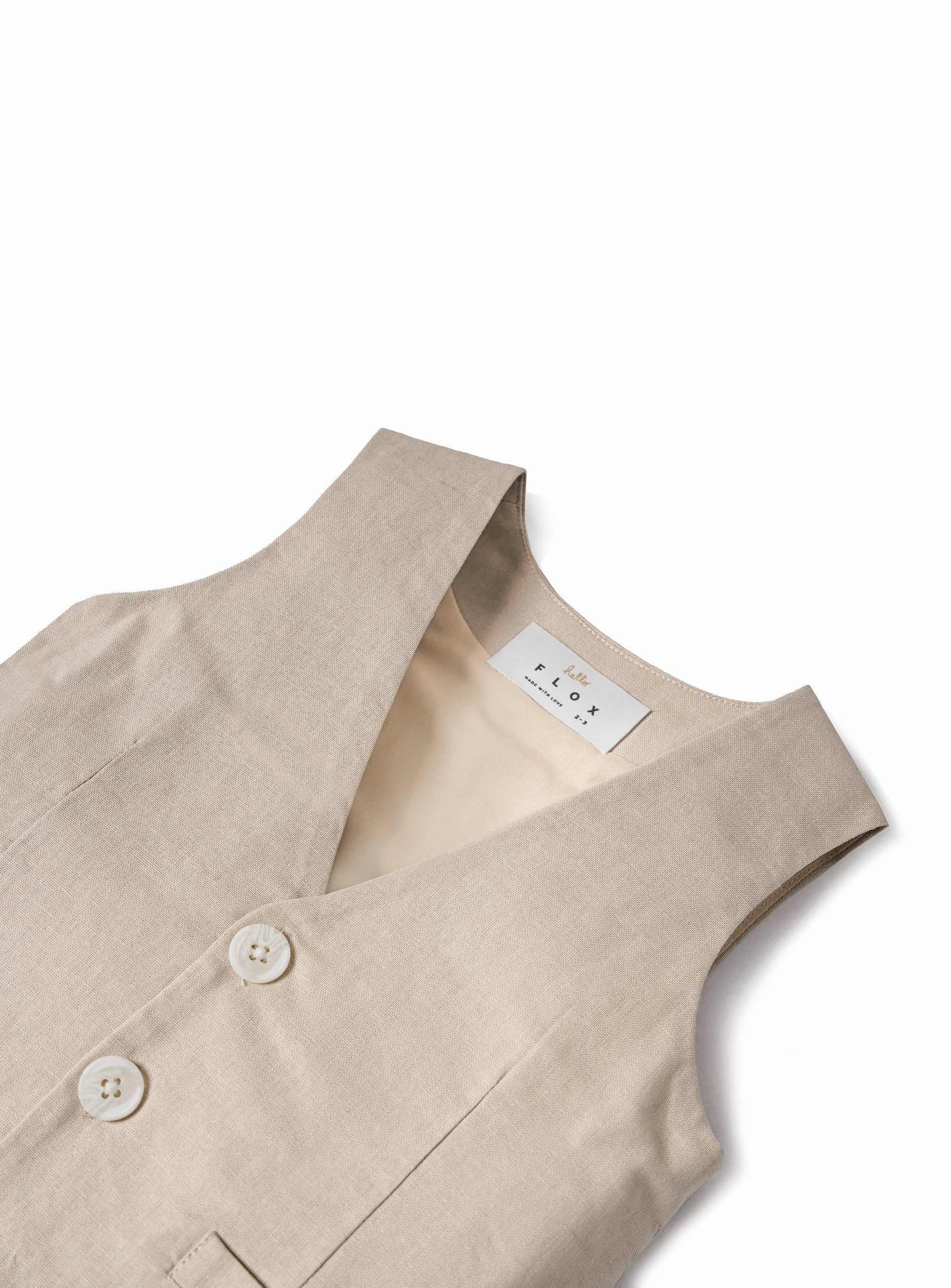 cafe au lait vest with cream button