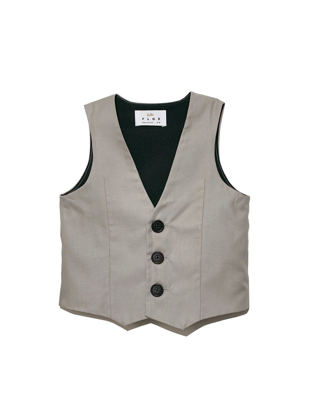 light grey vest with black buttons