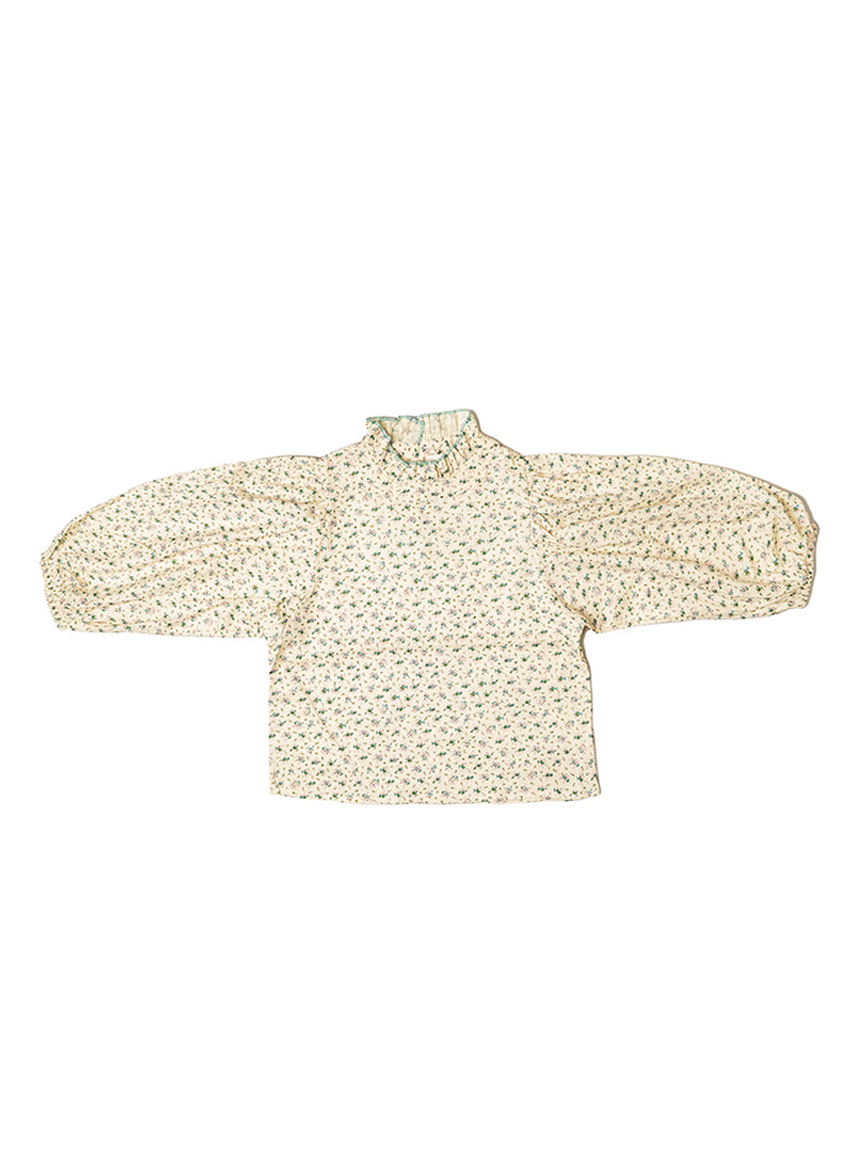 modest khaki baggy top with idyllic flower detail