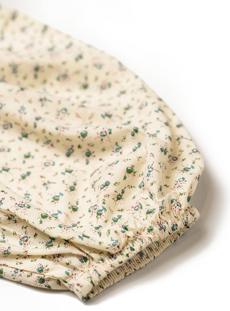 khaki baggy top with idyllic flower detail