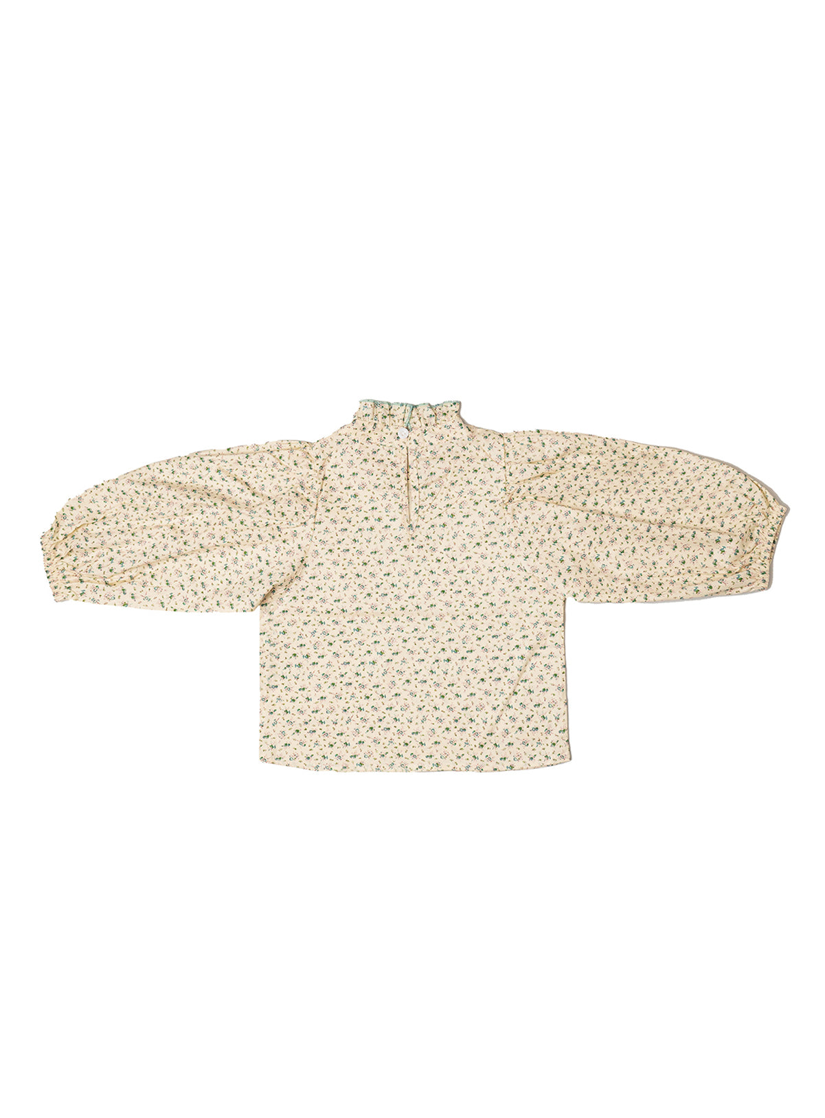 modest khaki baggy top with idyllic flower detail