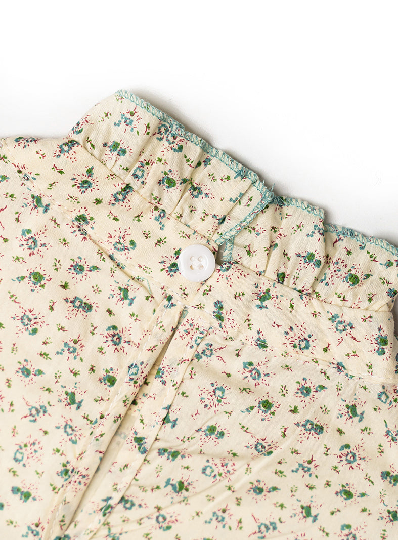 khaki baggy top with idyllic flower detail